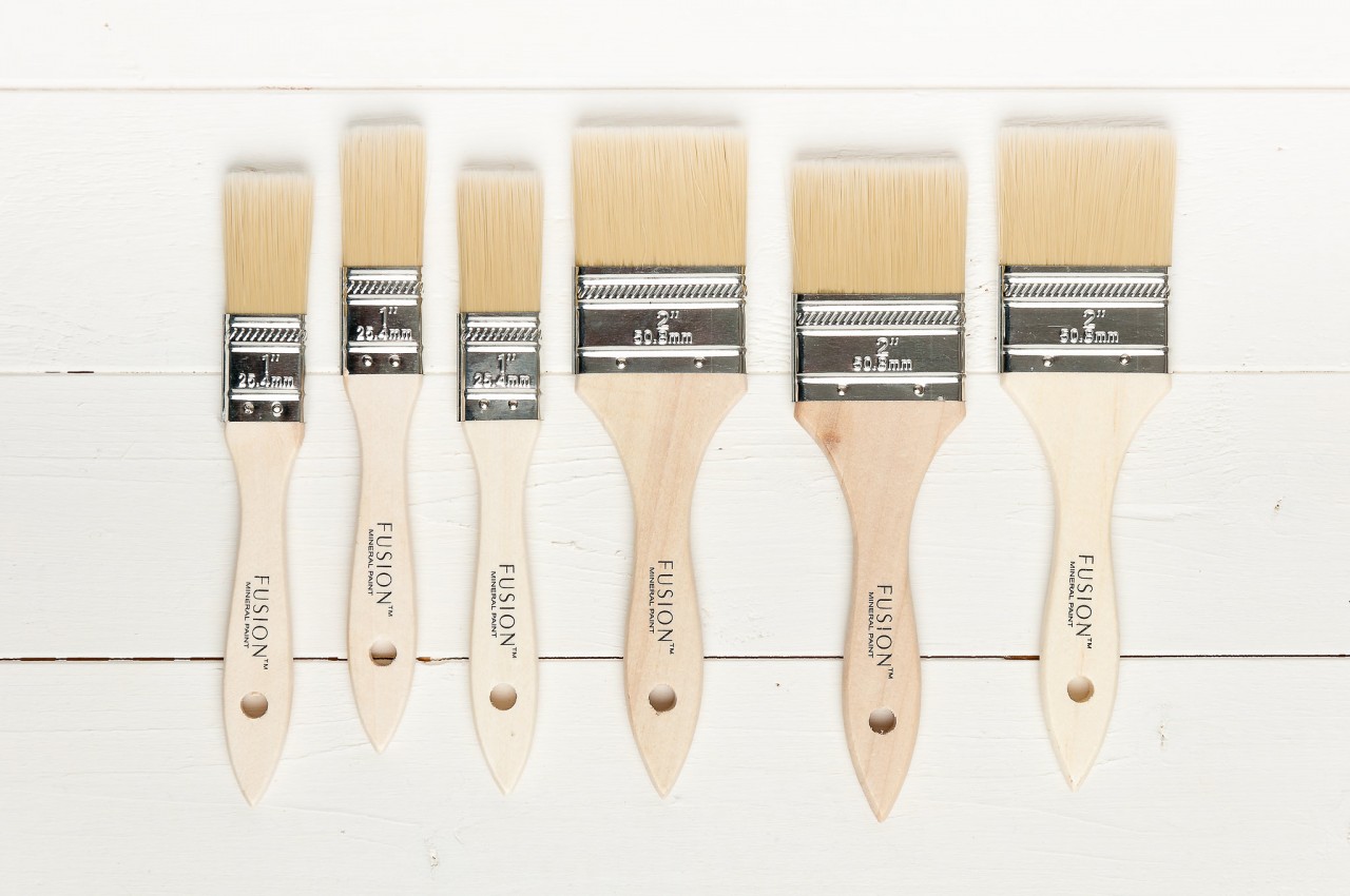 Flat synthetic brushes are inexpensive and create a super smooth finish