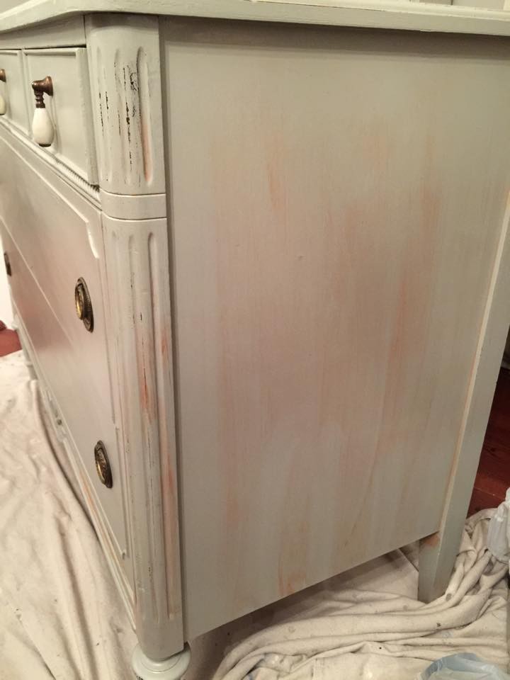 side of dresser with bleed through