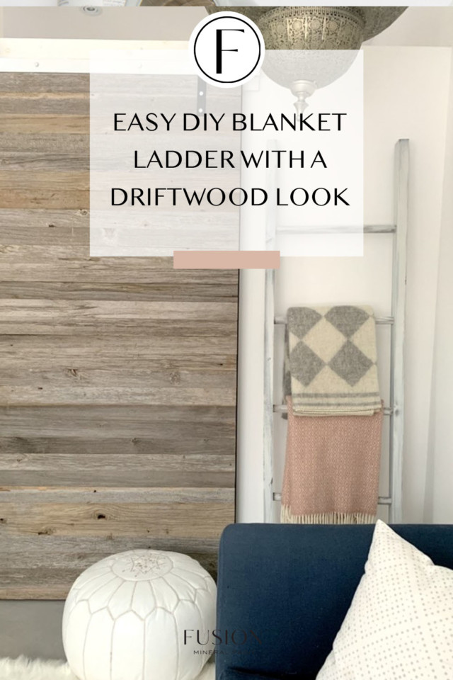 image of blanket ladder beside wood feature wall