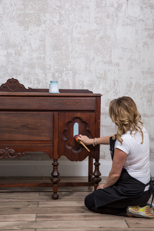 Jennylyn painting the sideboard with Champness