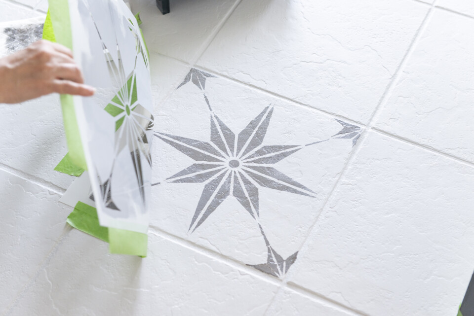 Removing stencil from tile floor after being painted with hazelwood