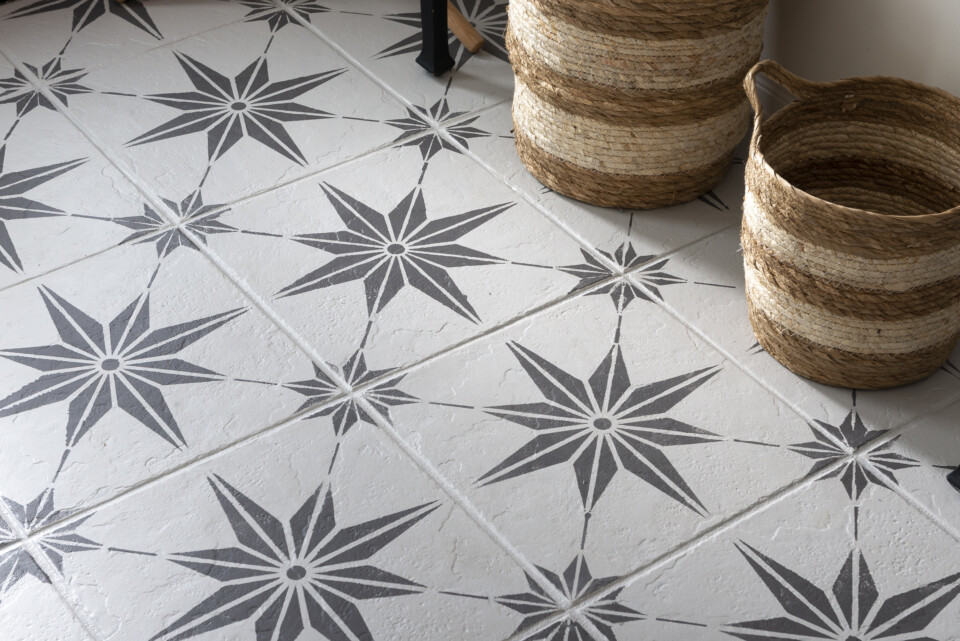 Close up of stencilled floor tile 