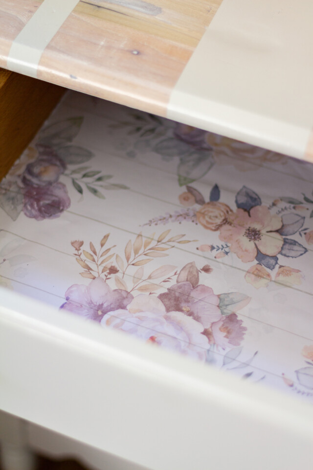 Close up picture of inside a drawer, floral decal