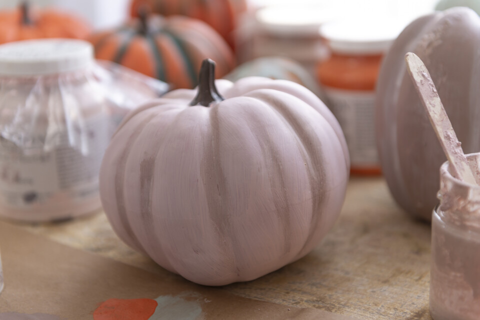 Pink pumpkin with furniture wax on it to create dimension