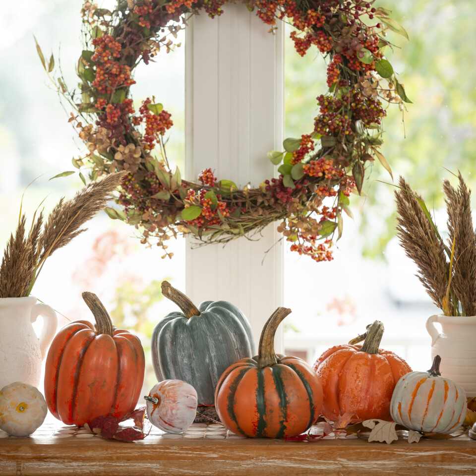 Close up image of the fall theme table with pumpkins