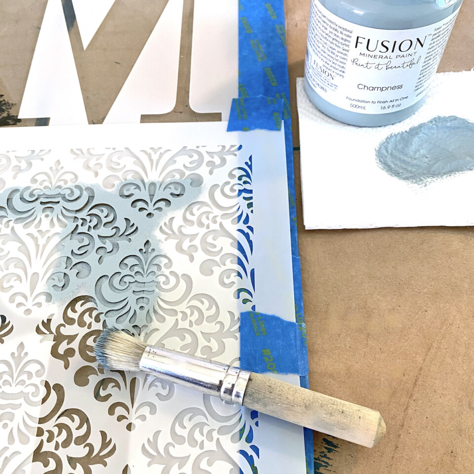 Painting M and design stencil with Champness (blue) fusion mineral paint