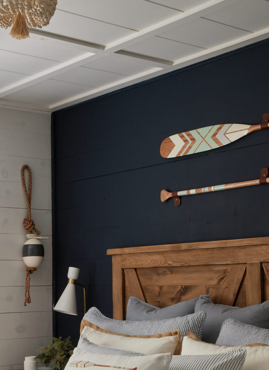 The Nautical Room  / cottage make over series - up close photo of dark feature wall with painted paddles
