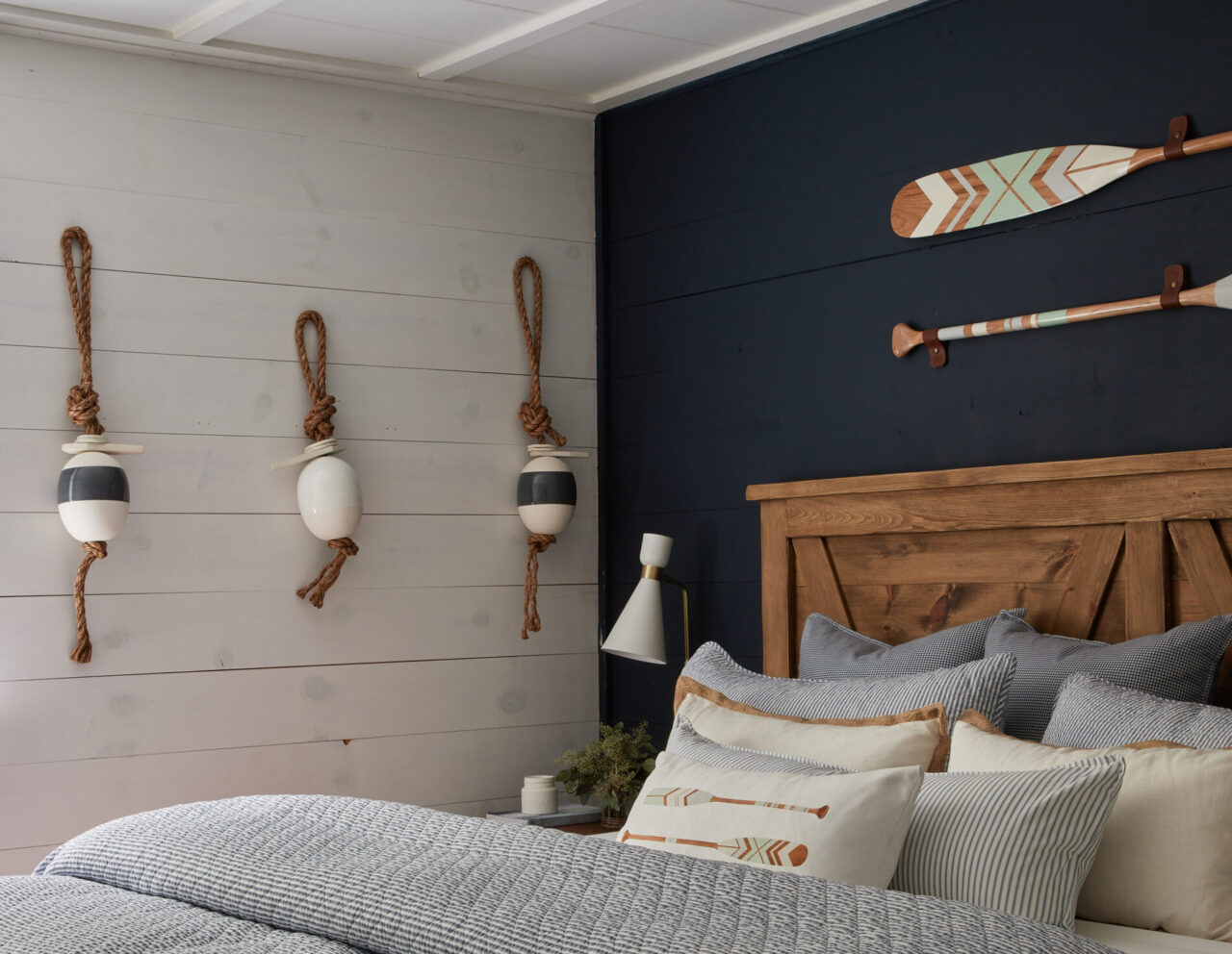 cottage makeover series, hanging buoys as home decor on white washed wall