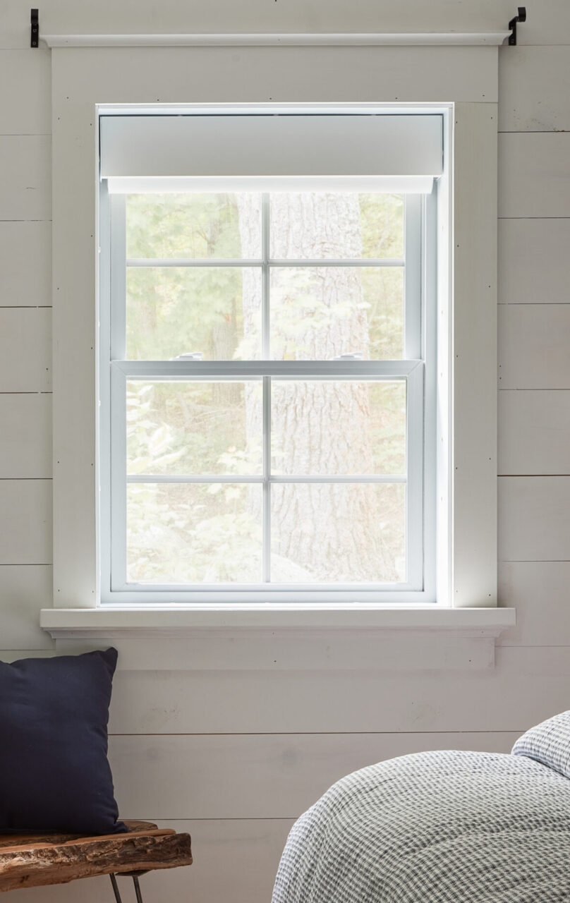 cottage makeover series - close up of custom blinds on open window
