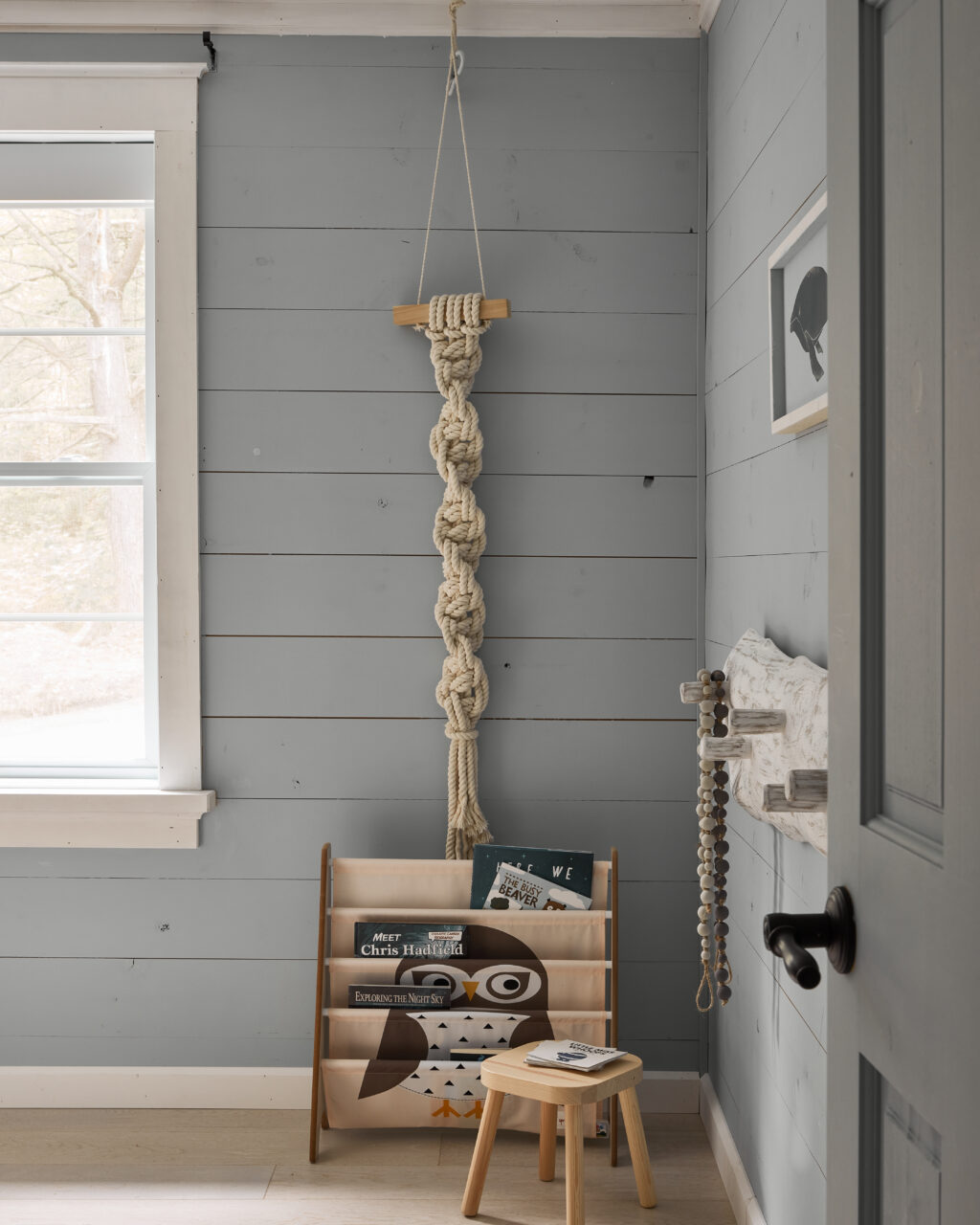 kid's cottage room painted in blue with neutral kids decor