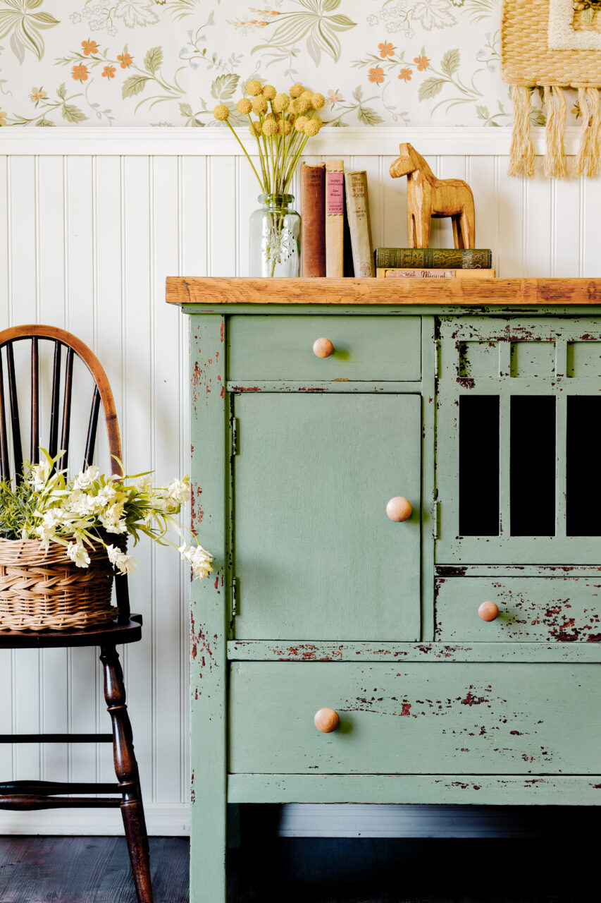 Staged cabinet painted in Stockholm Green a New HH Milk Paint Colour