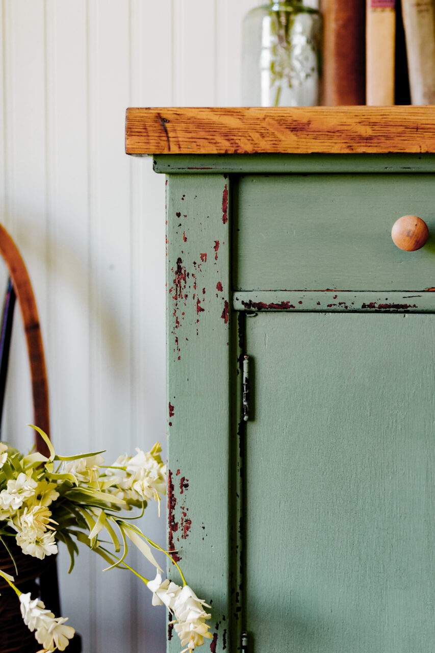 Staged cabinet painted in Stockholm Green a New HH Milk Paint Colour