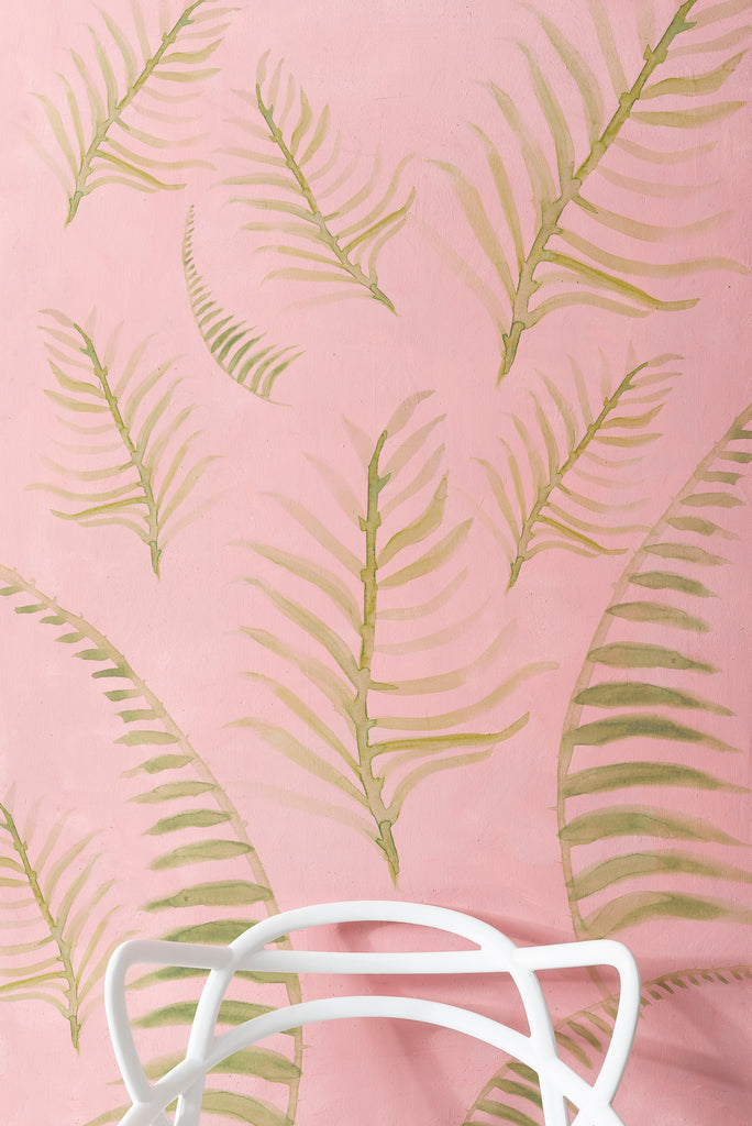 palm springs pink accent wall with leafs