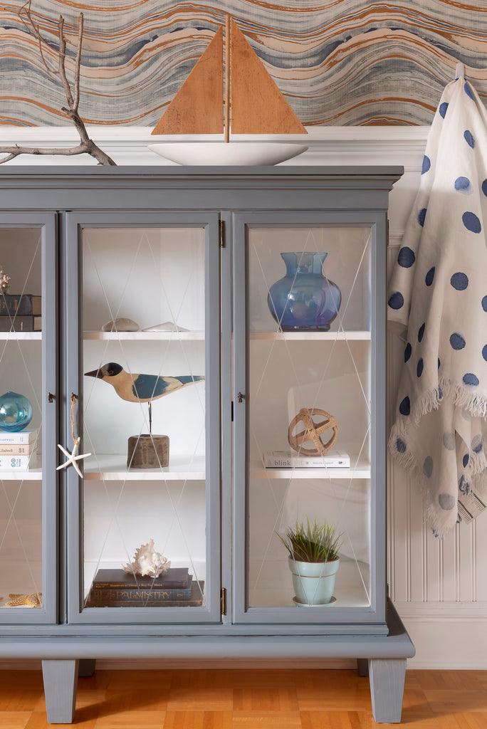 staged piece in the blog Upcycling a China Cabinet into a Display Case