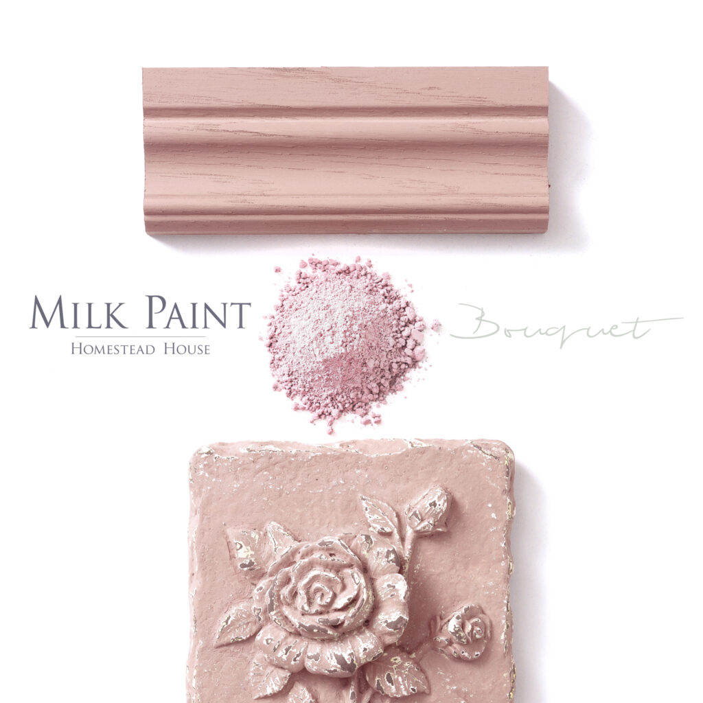 pile of milk paint in a pink shade and a painted decorative trim in the same pink colour