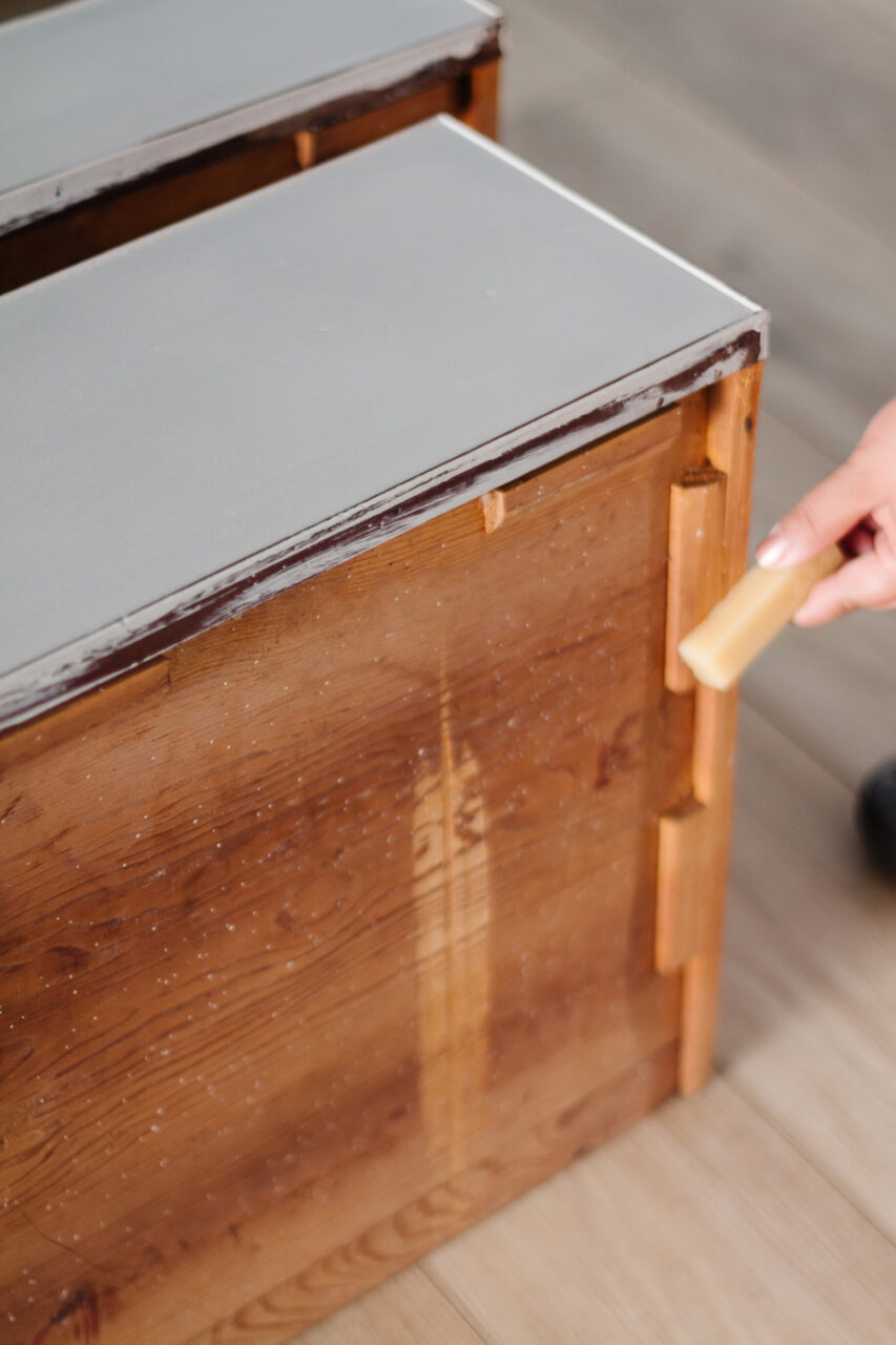 Beeswax block being used to 'grease' the drawer runners